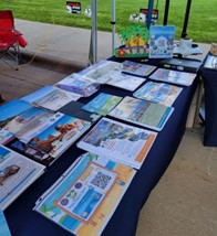 A table featuring travel brochures.
