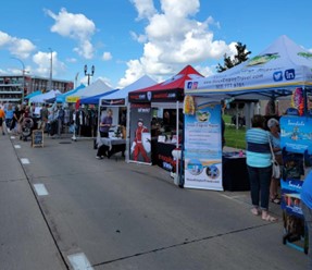 The Sioux Empire Travel booth at Riverfest.