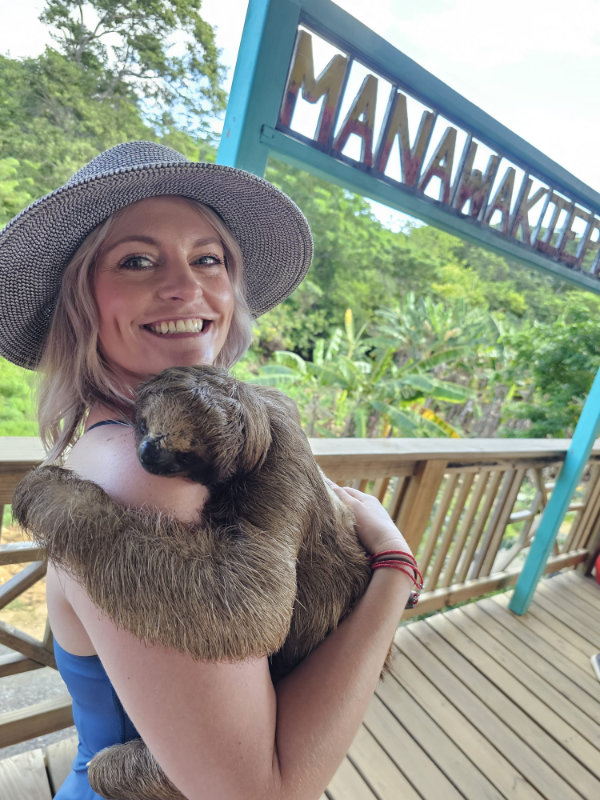 Stacy with a sloth